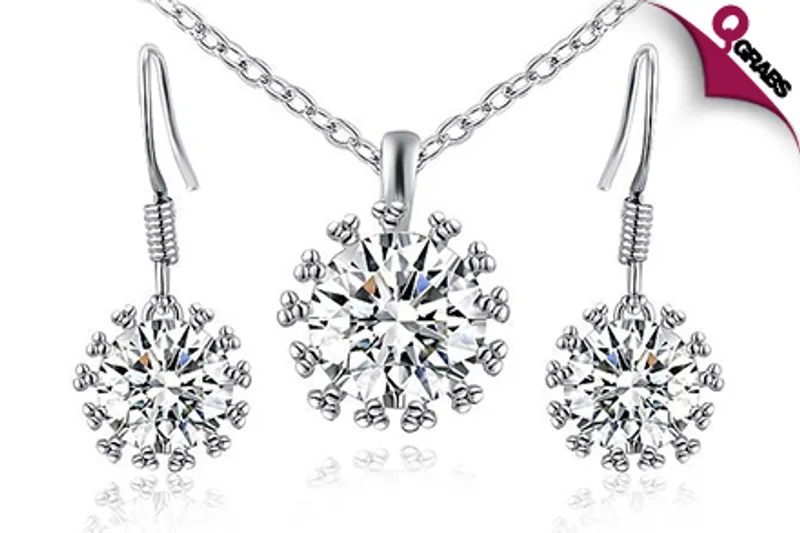 From QR99, Sparkle with a Shimmering Snowflake Crystal Pendant & Earring Set! (Up to QR398 Value)